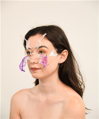 CID SPD08 Morgan Chen A model wearing the Social Prosthesis headpiece nosepiece and touch sensing temporary tattoo 2022 Credit  Andrea Cheon